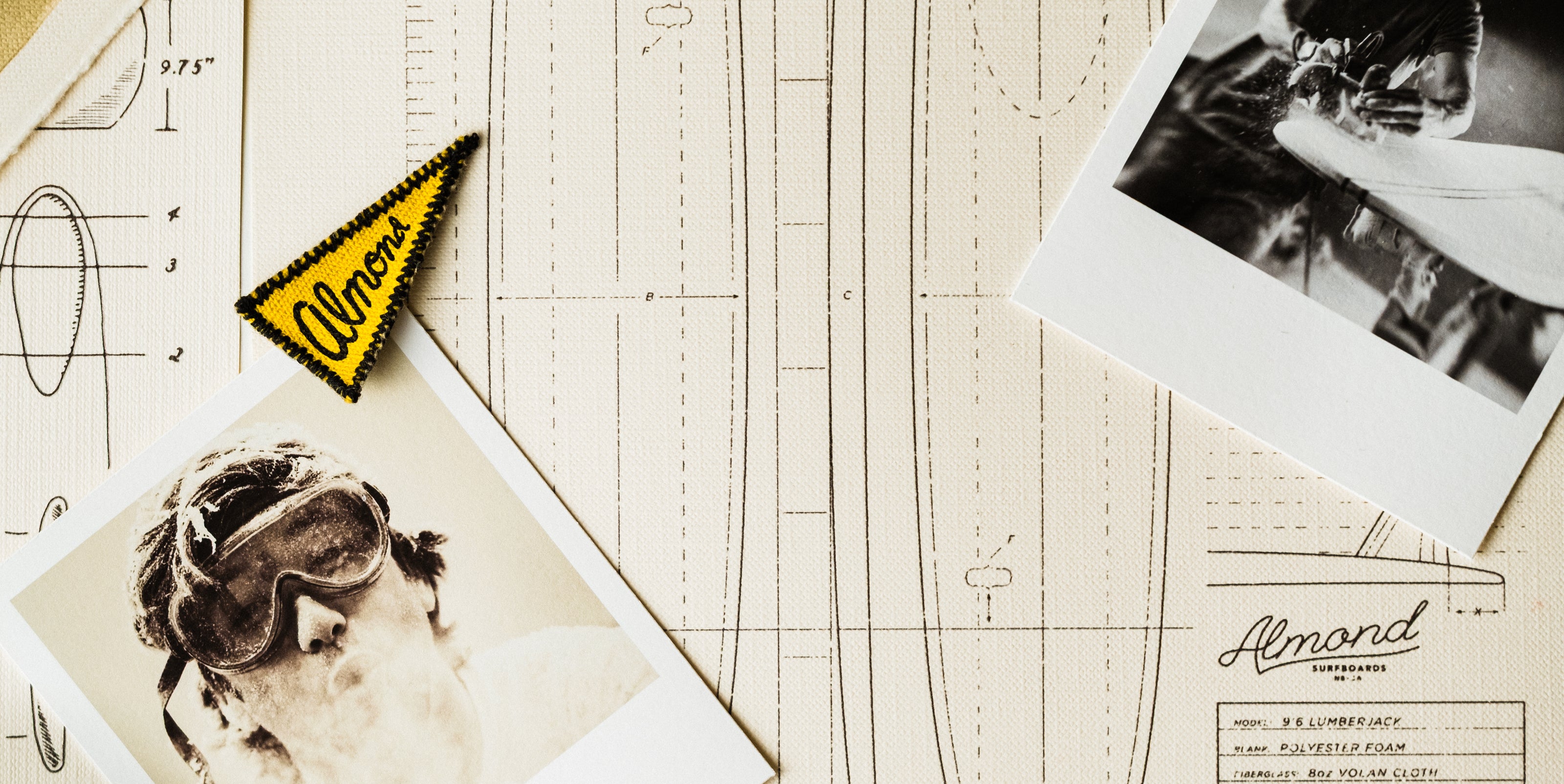 Vintage photos on a blueprint with 'Almond' branding.