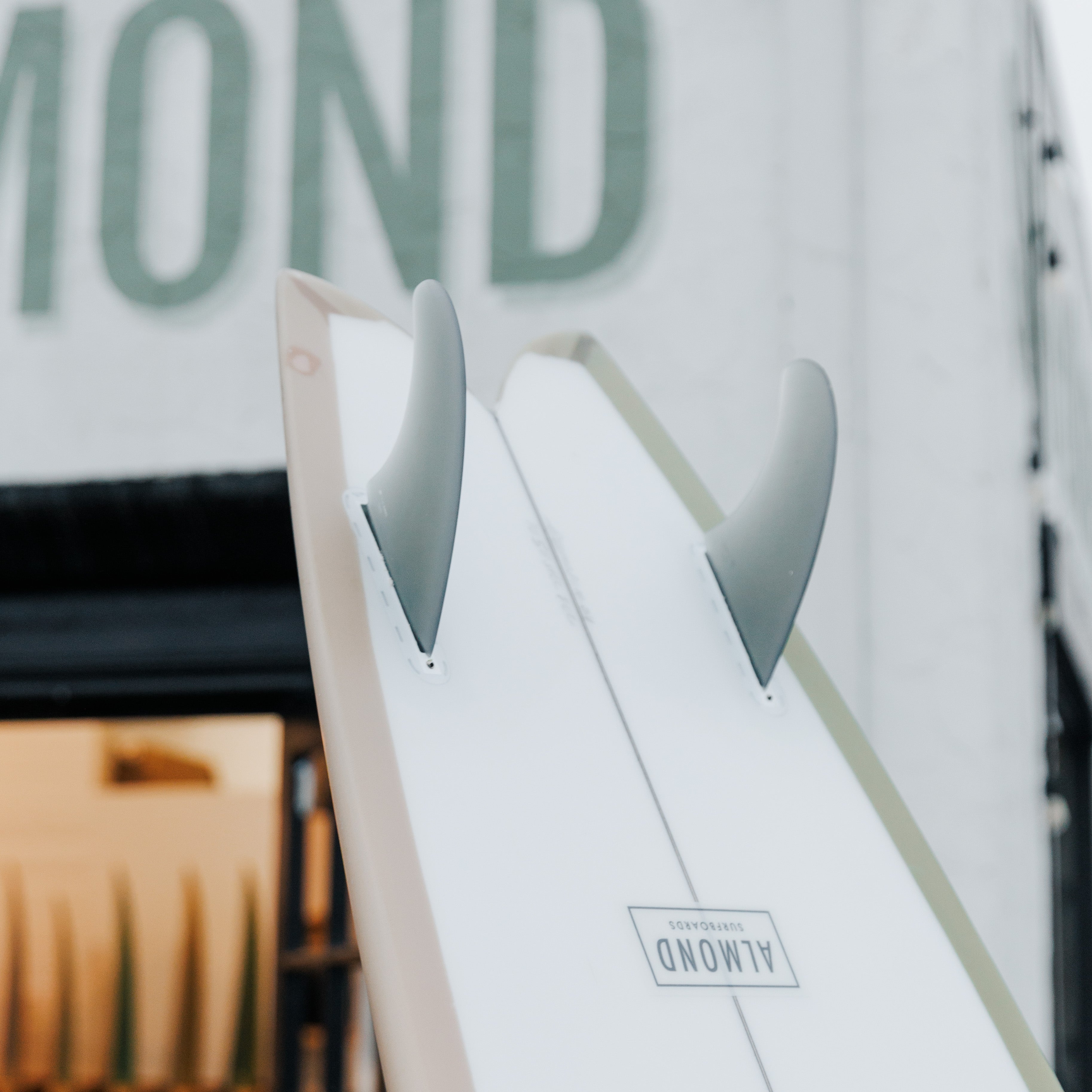 A board in front of a blurred building